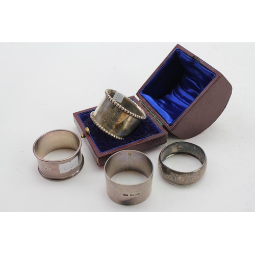 10 - A Heavy Silver Napkin Ring in Original Case. Weighing 55 grams along with three other Napkin Rings. ... 