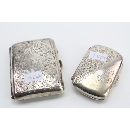 16 - A Victorian Silver engraved Ladies Cigarette Case along with one other.