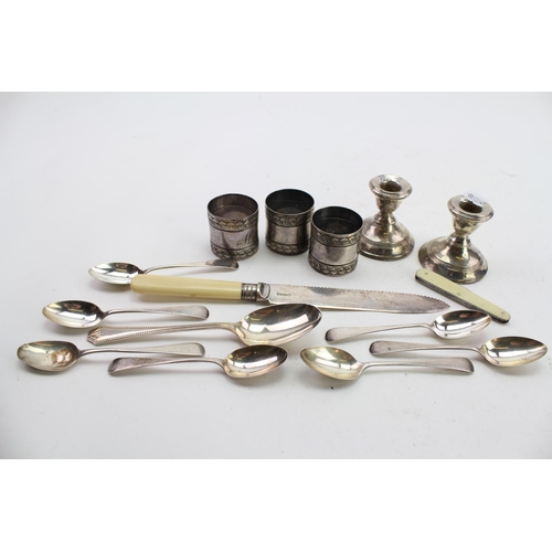 18 - A Set of 6 Silver Tea Spoons along with a similar Desert Spoon. Weighing: 149 grams. Along with Dres... 
