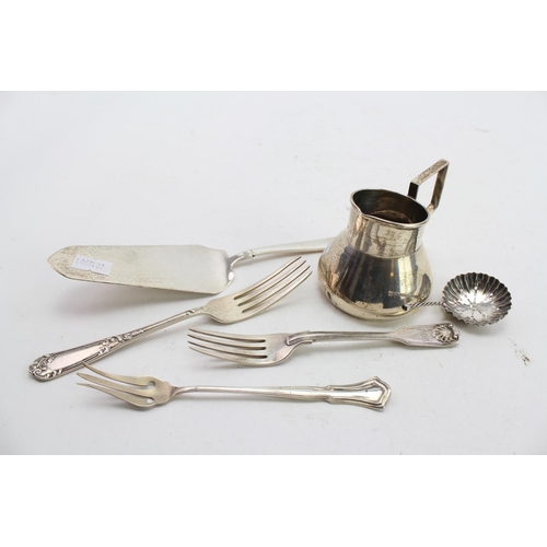 25 - A Silver Pie Server, Silver table forks, Silver squat cream jug. Total Weight: 216 grams.