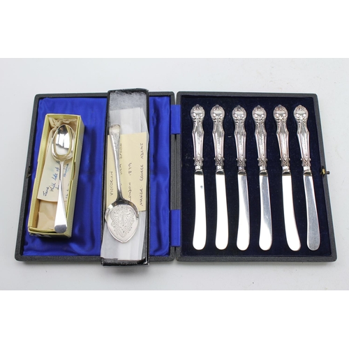 36 - A set of Silver handled butter knives a Victorian jam spoon and tea spoon.