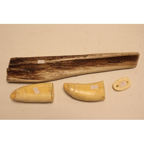 668 - Reproduction Whales Teeth Scrimshaws decorated with Boats, a Buckle & a Resin Nantucket Whaler.