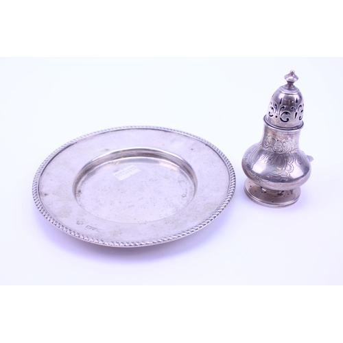 23 - A Silver Butter Dish Base & a Silver Castor. Weighing: 183 grams.
