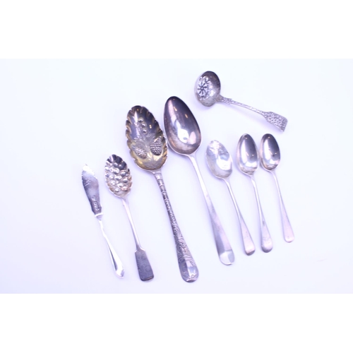 26 - 2 Silver Georgian Table Spoons, one later embossed, a Sugar Sifter & other items of cutlery.