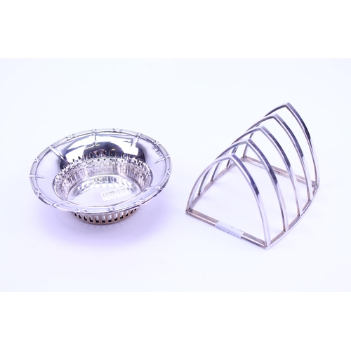 34 - A Pair of Silver Bon Bon Dishes along with a Modern Silver Toast Rack. Weighing: 175 grams.