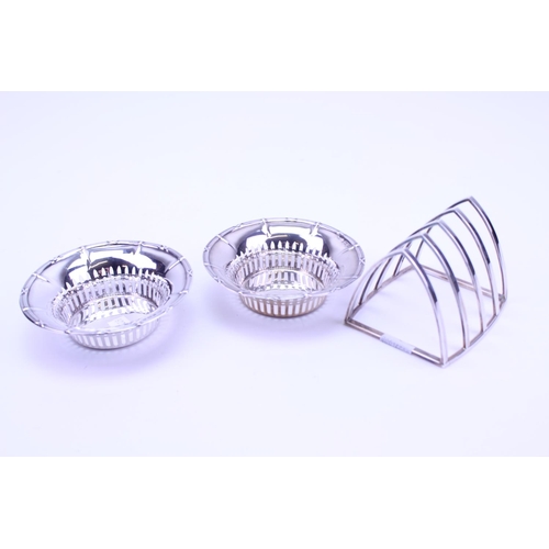 34 - A Pair of Silver Bon Bon Dishes along with a Modern Silver Toast Rack. Weighing: 175 grams.