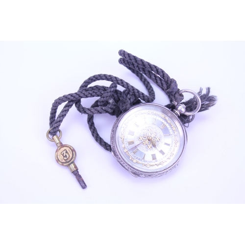 139 - A Ladies Silver (935) Swiss Pocket Watch with Gold & engraved Dial with Key.