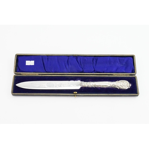 11 - A Cake Knife & Tea Spoons, all in Original Cases.