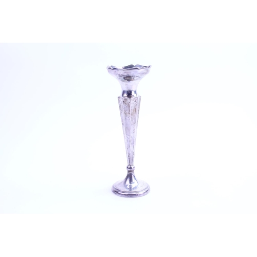19 - A Silver fluted and shaped top spill vase resting on pedestal base. Total weight approximately 171 g... 