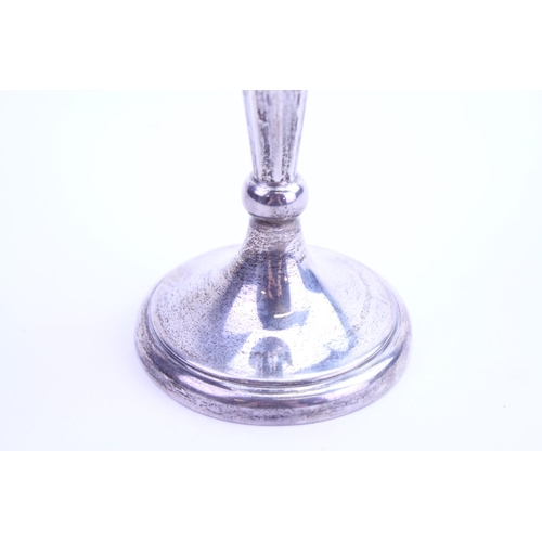 19 - A Silver fluted and shaped top spill vase resting on pedestal base. Total weight approximately 171 g... 