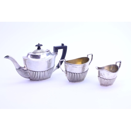 20 - A 1915 Joseph Rodgers & Sons Silver Batchelors Three Piece Tea Set with fluted decoration, Sheffield... 