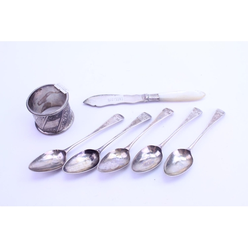 22 - A Collection of Georgian Silver teaspoons and a Silver Napkin Ring. Weight approximately: 104 grams.
