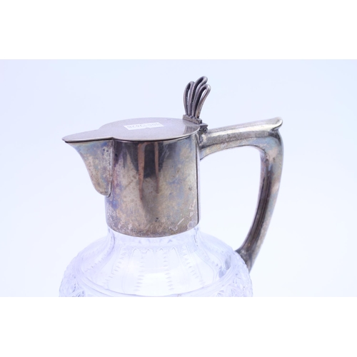 23 - A Silver Mounted (800) mark Cut Glass Claret Jug with Flip Lid.