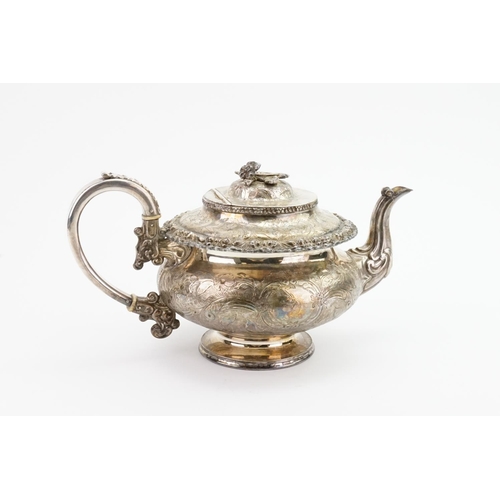 33 - A Late 19th Century Silver Plated Tea Pot with gadrooned Floral decoration & Floral Cast Leaf Spout.