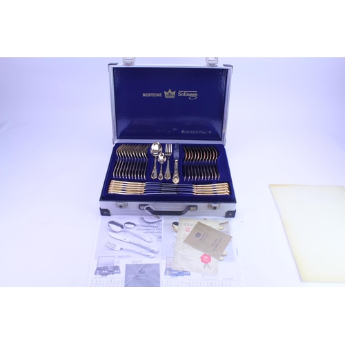 46 - An Original SBS Bestecke Solingen Gold Plated Cutlery Set contained in a Steel Briefcase. The Set wa... 