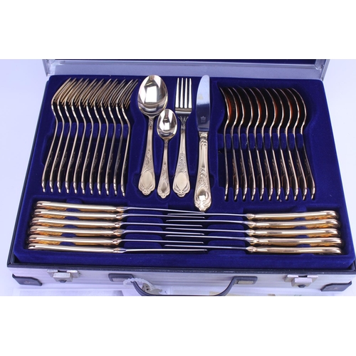 46 - An Original SBS Bestecke Solingen Gold Plated Cutlery Set contained in a Steel Briefcase. The Set wa... 