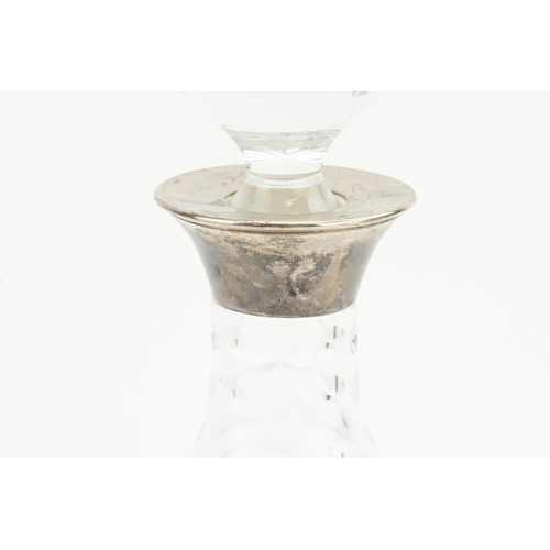 7 - A Silver Mounted Cut Glass Decanter & Stopper.