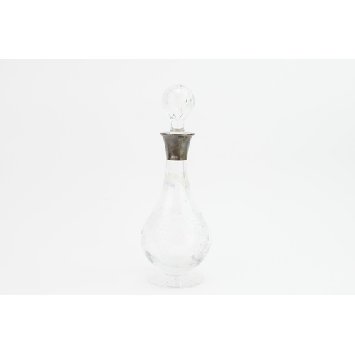 8 - A Silver Mounted Cut Glass Decanter & Stopper.