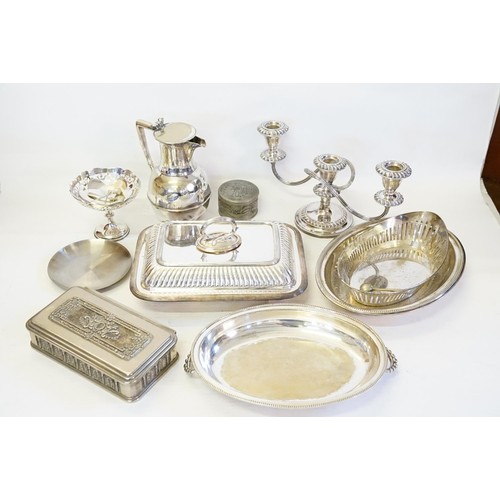 39 - An Electro Plated Coffee Jug, Silver Plated Bread Basket, two Tureens, Candelabra along with three P... 