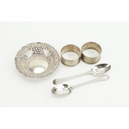 11 - A Silver Pin Dish, two Bright Cut Silver Tea Spoons, two Napkin Rings, etc.