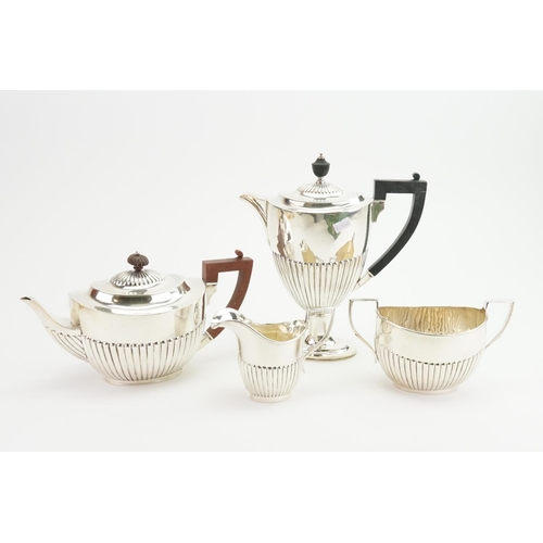 16 - A Silver Four Piece Coffee & Tea Set of Gadrooned Decoration. Various Hallmarks. Weighing: 1630 gram... 