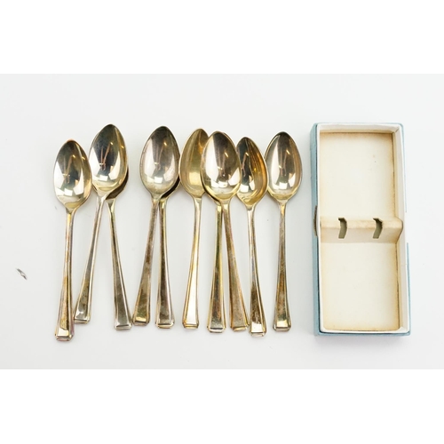 20 - A Set of 8 Art Deco Silver Tea Spoons. Weighing 260 grams.