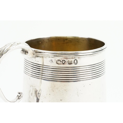 26 - A Georgian Silver Child's Can with ribbed decoration. London M. Weighing: 103 grams.