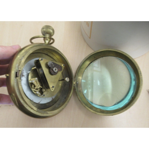 16 - A 20thC lacquered brass and glazed desktop timepiece; faced by a Beaumont of Switzerland dial with d... 