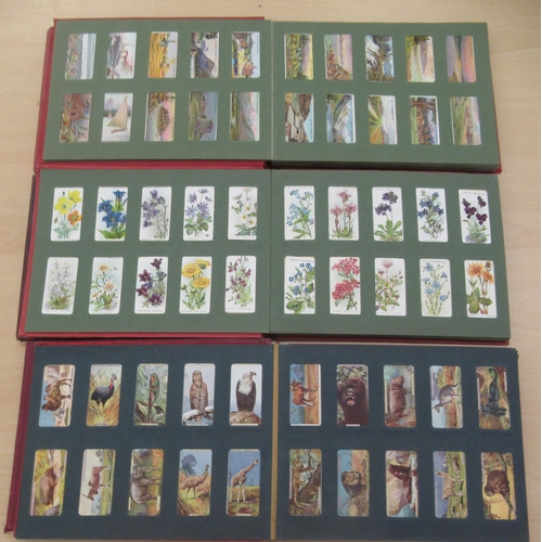 53 - Six album collections of Will's cigarette cards: to include early racing cars and railway locomotive... 