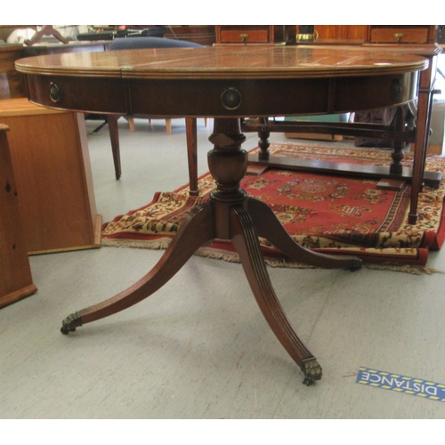 43 - A Regency design, faux drum top mahogany dining table, comprising a pair of D-ends, raised on a quad... 