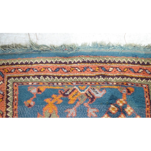 173 - A Persian runner, decorated with repeating stylised designs, on a multi-coloured ground  34