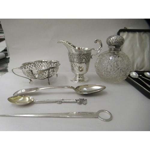 2 - Silver collectables: to include spoons, a presentation fork and a meat skewer  mixed marks ... 