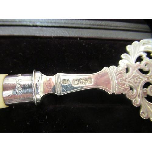 2 - Silver collectables: to include spoons, a presentation fork and a meat skewer  mixed marks ... 