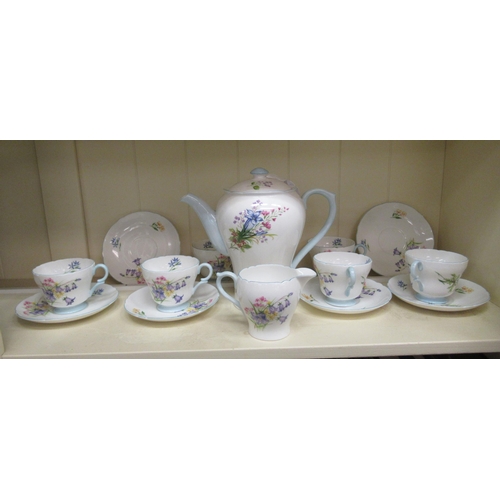 58 - A Shelly china Wild Flowers pattern tea set  no.13668  comprising a teapot, cream jug and six cups a... 