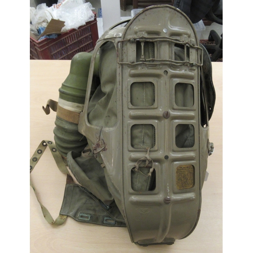 59 - A military issue Baby's gas mask with a visor panel   (Please Note: this lot is subject to the state... 