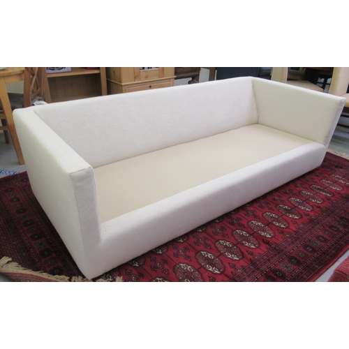 30 - A Terrance Conran two person settee, upholstered in cream coloured patterned fabric in the Marchwood... 
