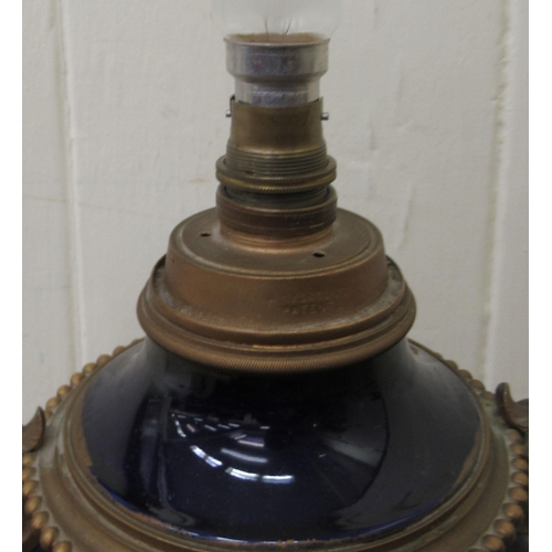 325 - A late 19thC blue glazed porcelain lamp base with gilded metal mounts  15