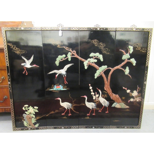 21 - A series of four black lacquered panels, each decorated in relief in Japanese taste  36
