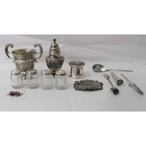 15 - Silver collectables: to include a Victorian pepper pot of urn design  London 1883 