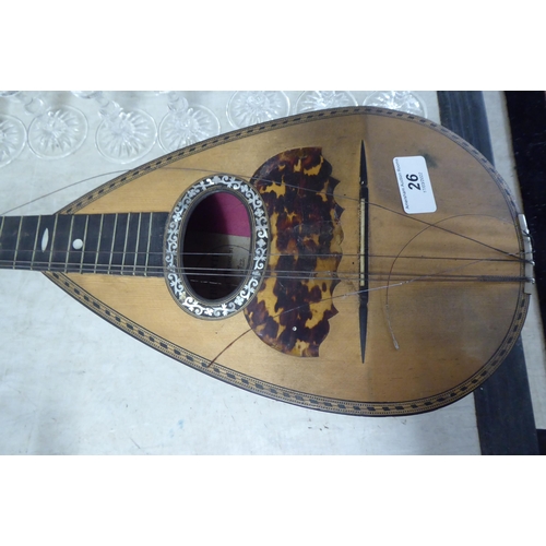 26 - A Stridente rosewood mandolin with inlaid mother-of-pearl and tortoiseshell decoration  cased&n... 