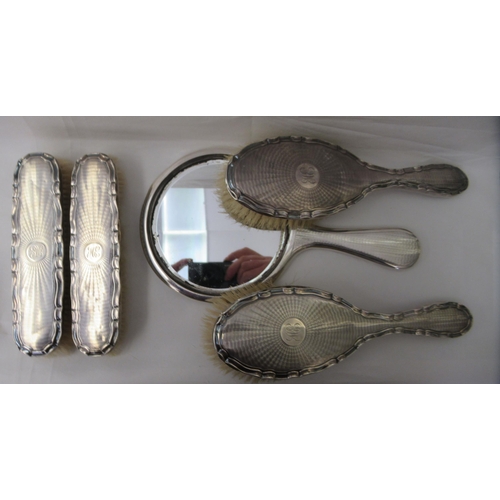 41 - A five piece silver backed dressing table set with engine turned decoration  Birmingham 1910&nb... 