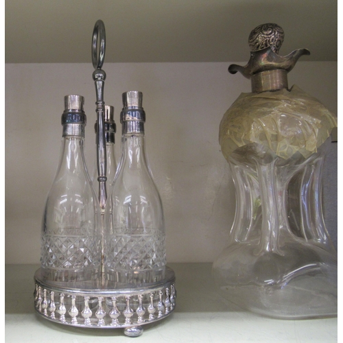 7 - A mixed lot: to include a late Victorian glass and silver plated claret jug, engraved with swags  9