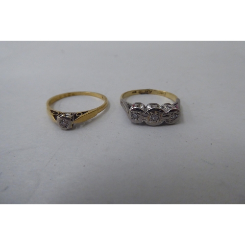 40 - Four 18ct gold variously set diamond rings 