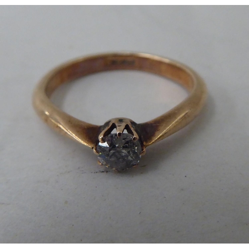 44 - An 18ct gold diamond solitaire ring 