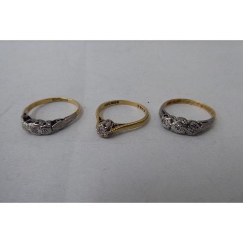 53 - Three 18ct gold variously set diamond rings