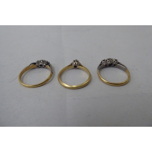 53 - Three 18ct gold variously set diamond rings
