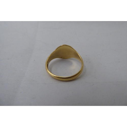 57 - An 18ct gold signet ring 