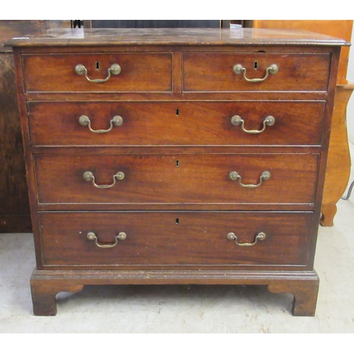 1 - A George III mahogany dressing chest with two short/three long drawers, raised on bracket feet  32