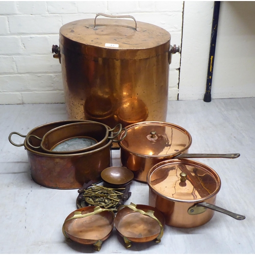 13 - 19thC and later metalware: to include a copper cooking pot with an iron swing handle  13