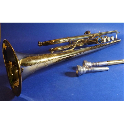 A Brass Corton Trumpet Serial Number 6668 Cased And With Barnebys